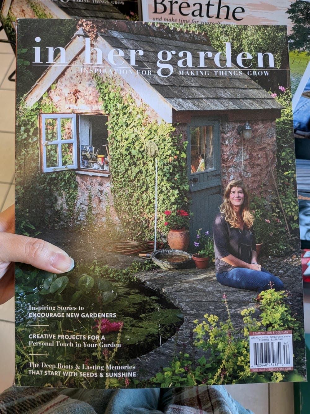 in her garden magazine front cover of in her garden magazine